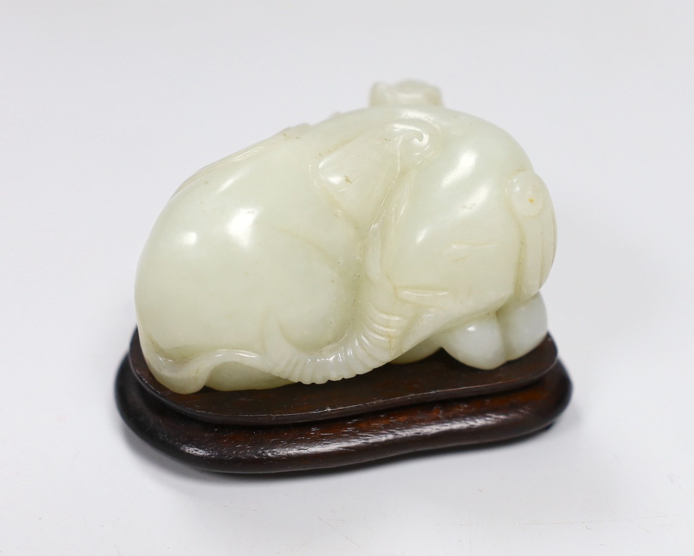 Chinese white jade carving of a monkey and elephant, with wooden stand - 8cms wide and a Chinese bronze figure